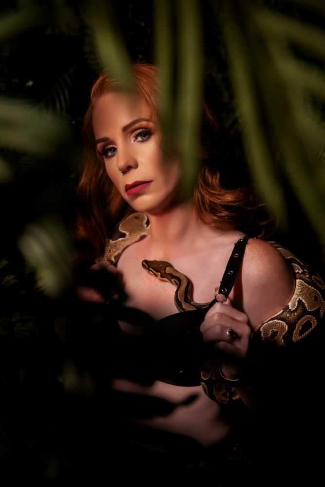 Glamorous and sensual photo with snake capturing the beauty and empowerment of a woman in Carefree, AZ